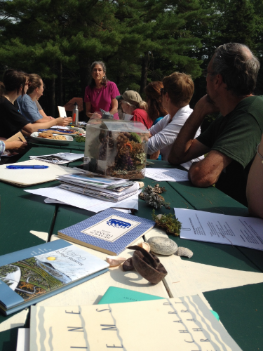 Poet Judy Steinbergh leading participants through readings of nature poetry before they set off to write there own.
