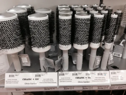 Olivia Garden " Ceramic + ion " round brushes are incredible. They are smooth yet don't slip. I've been using them at home and in the salon for years. 
