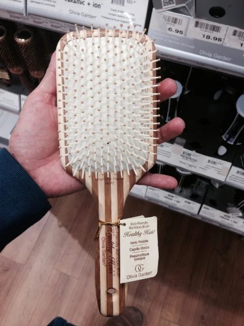 I 've been happy with any sort of wooden paddle brush. This one is Olivia Garden, Ionic paddle