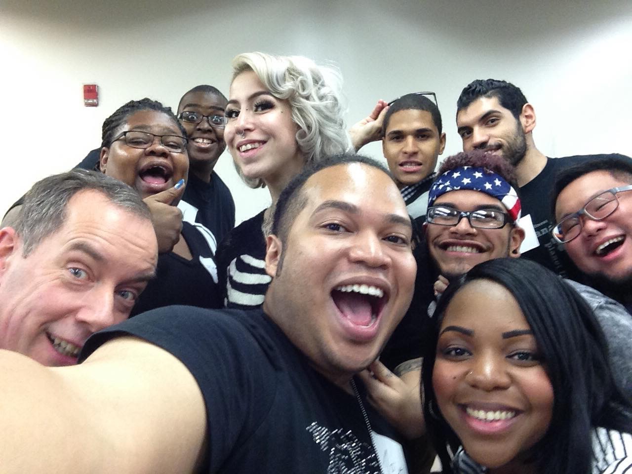 Youth Pride Chorus Alumni take a selfie ...