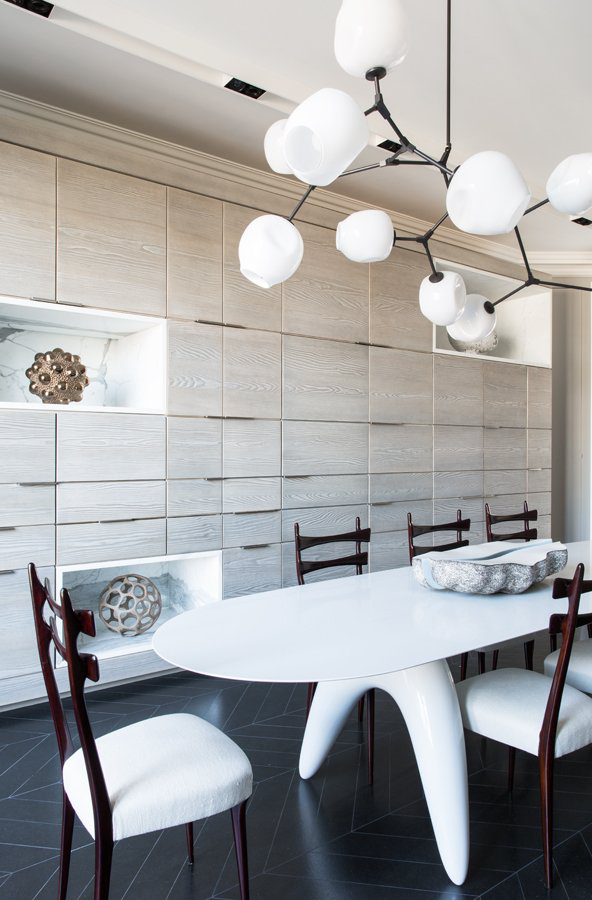 modern-kitchen-eat-in-oval-table-modern-light-built-in-cabinets-cococozy-damienlangloismeurinne.png