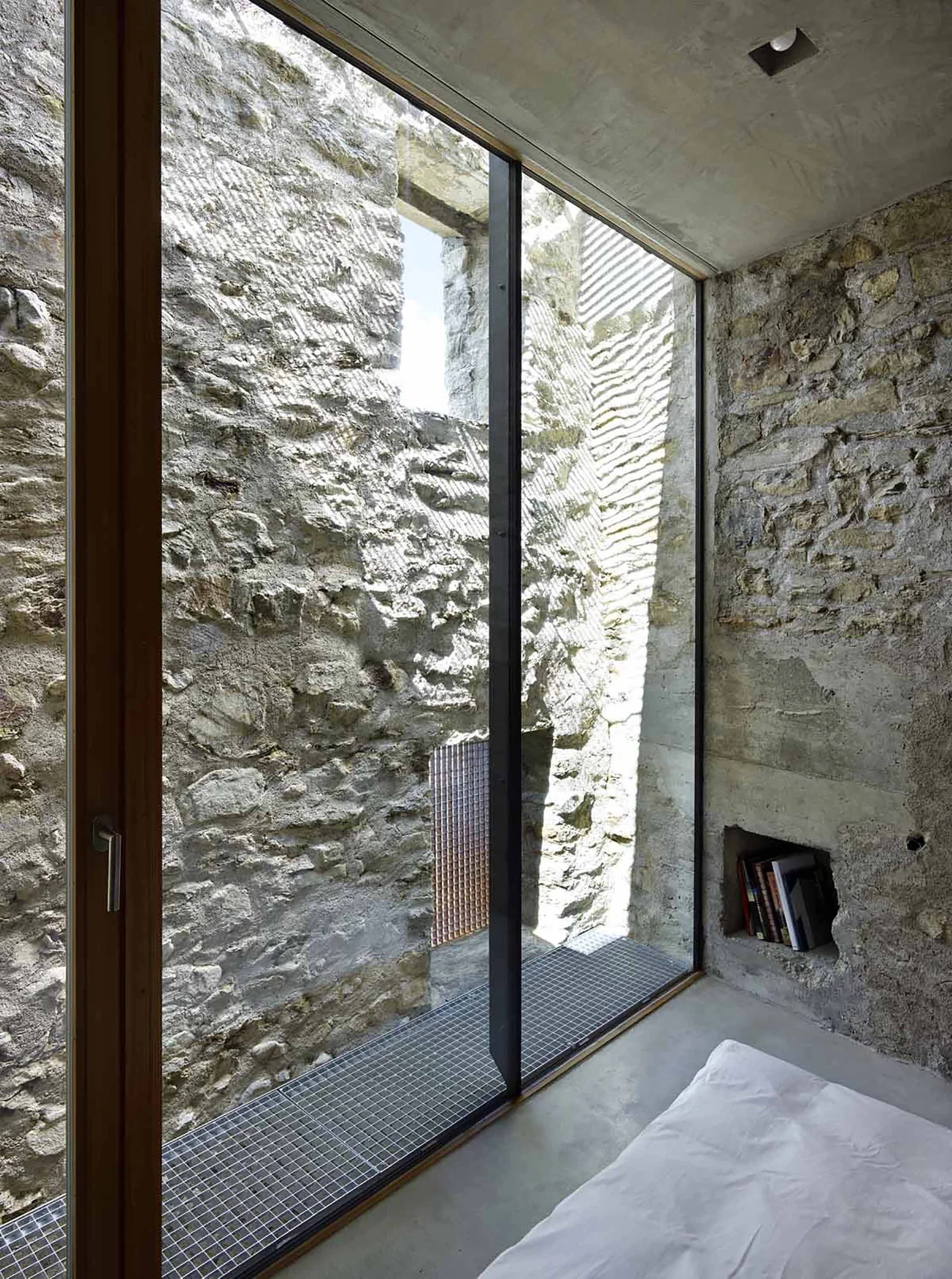 543dd5a6c07a80762d00024b_stone-house-transformation-in-scaiano-wespi-de-meuron-romeo-architects_1430_cf030063.jpg