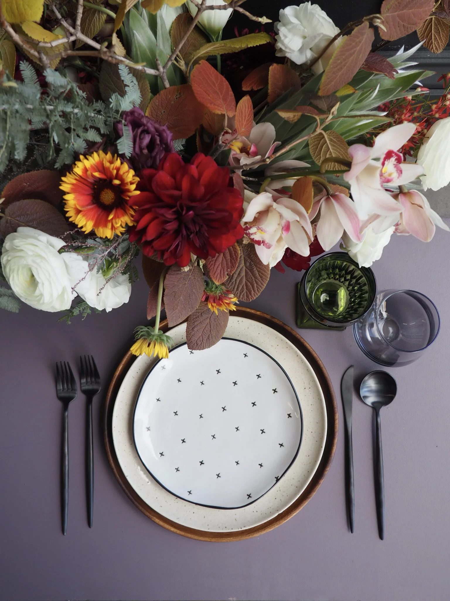 Eclectic Green Goblet, Smoke Grey Stemless, Black Flatware, Acacia Wood Charger & Speckled Dinner Plate