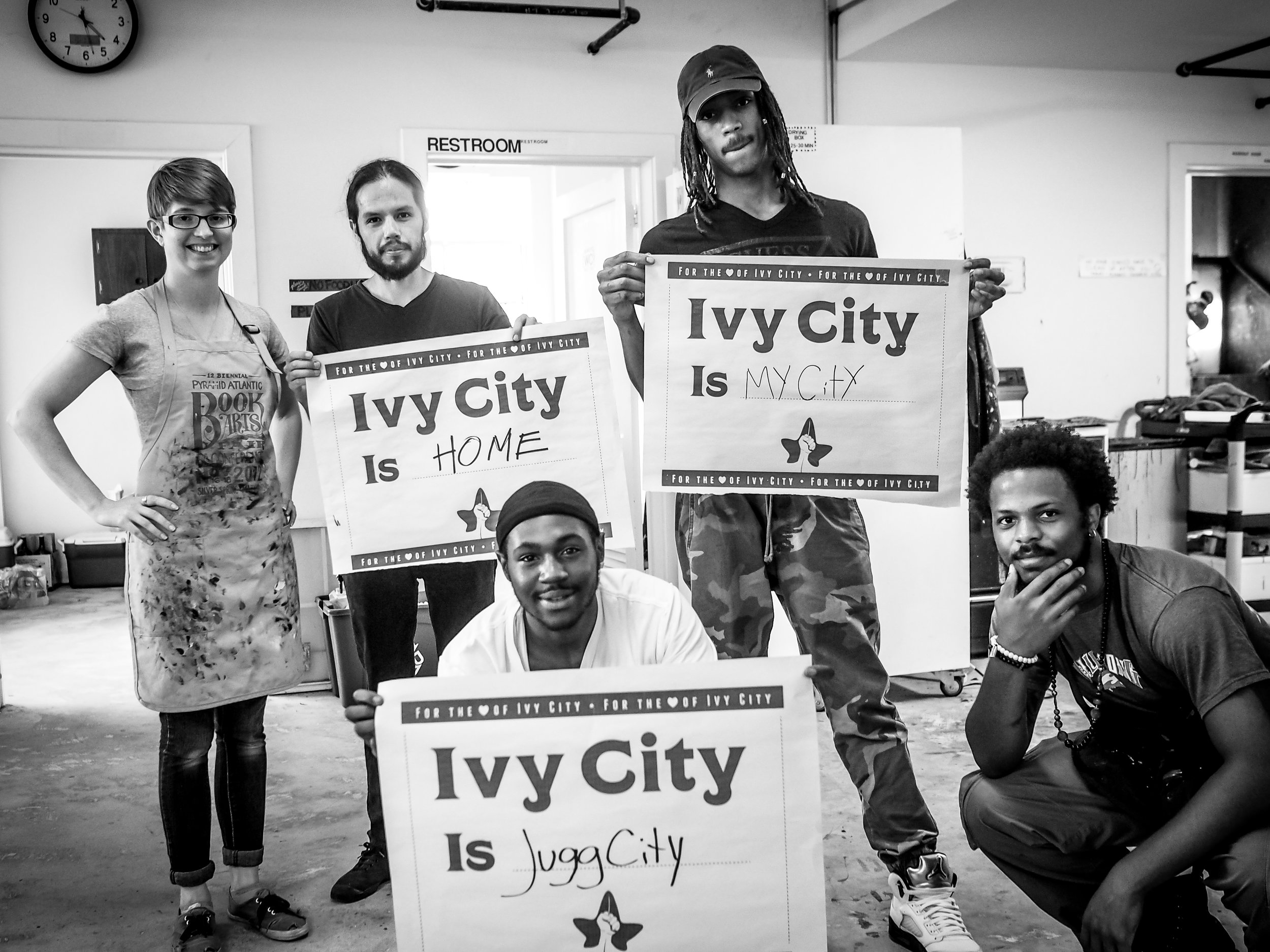 The Sanctuaries artists and Empower DC youth community organizers screen print yard signs for residents. Photos (above and below) by Rev. Erik Martinez Resley of The Sanctuaries .