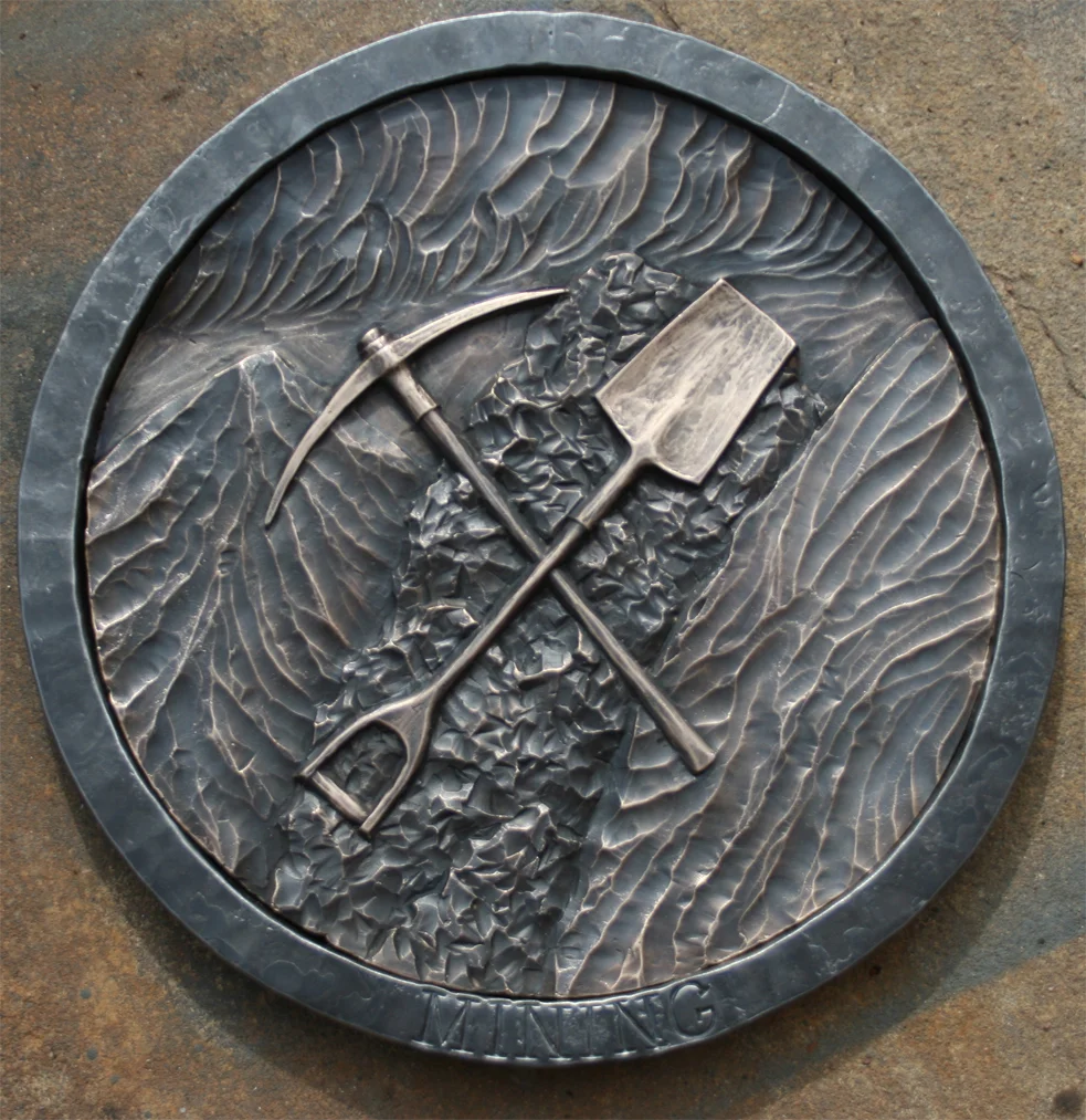 Ben Watkins' lost wax carving in collaboration with Jeremyah's forged metal ring-frame.