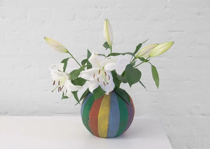 Customizing mass-produced Objects (The Vase Series, rainbow), 2011 Found basketball, water, flowers