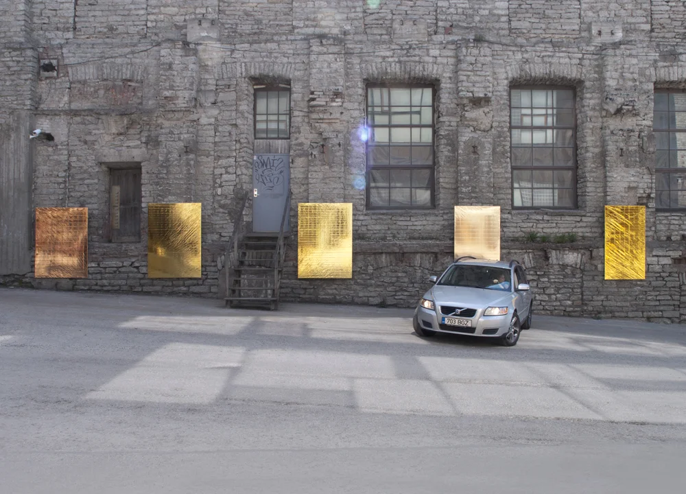BRAND NEW PAINTINGS CAUGHT IN THE HEADLIGHTS OF PARKING CARS, 2013 Mylar emergency blankets (gold), stretchers, cars Dimensions variable