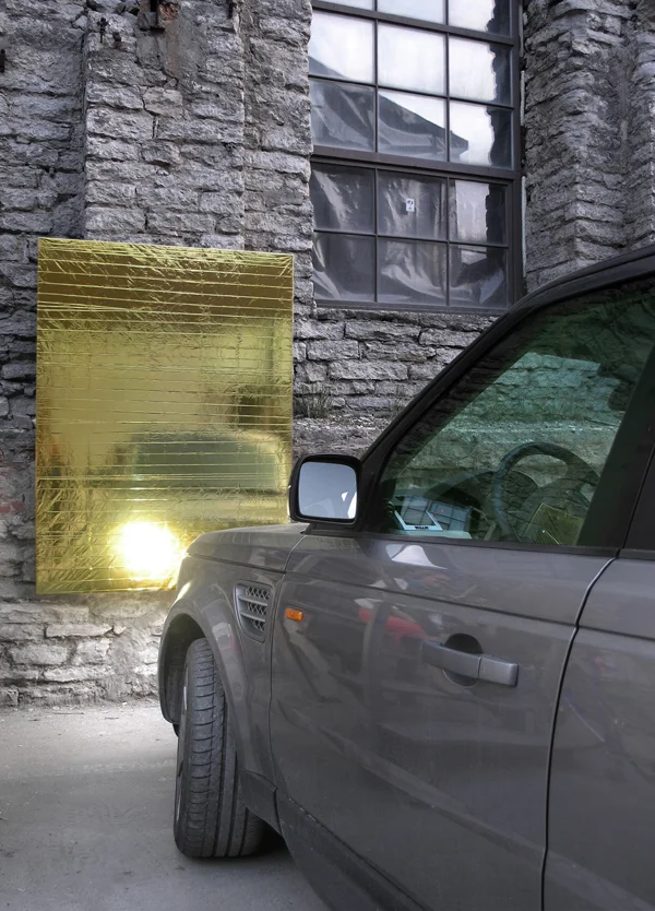 BRAND NEW PAINTINGS CAUGHT IN THE HEADLIGHTS OF PARKING CARS, 2013 Mylar emergency blankets (gold), stretchers, cars Dimensions variable