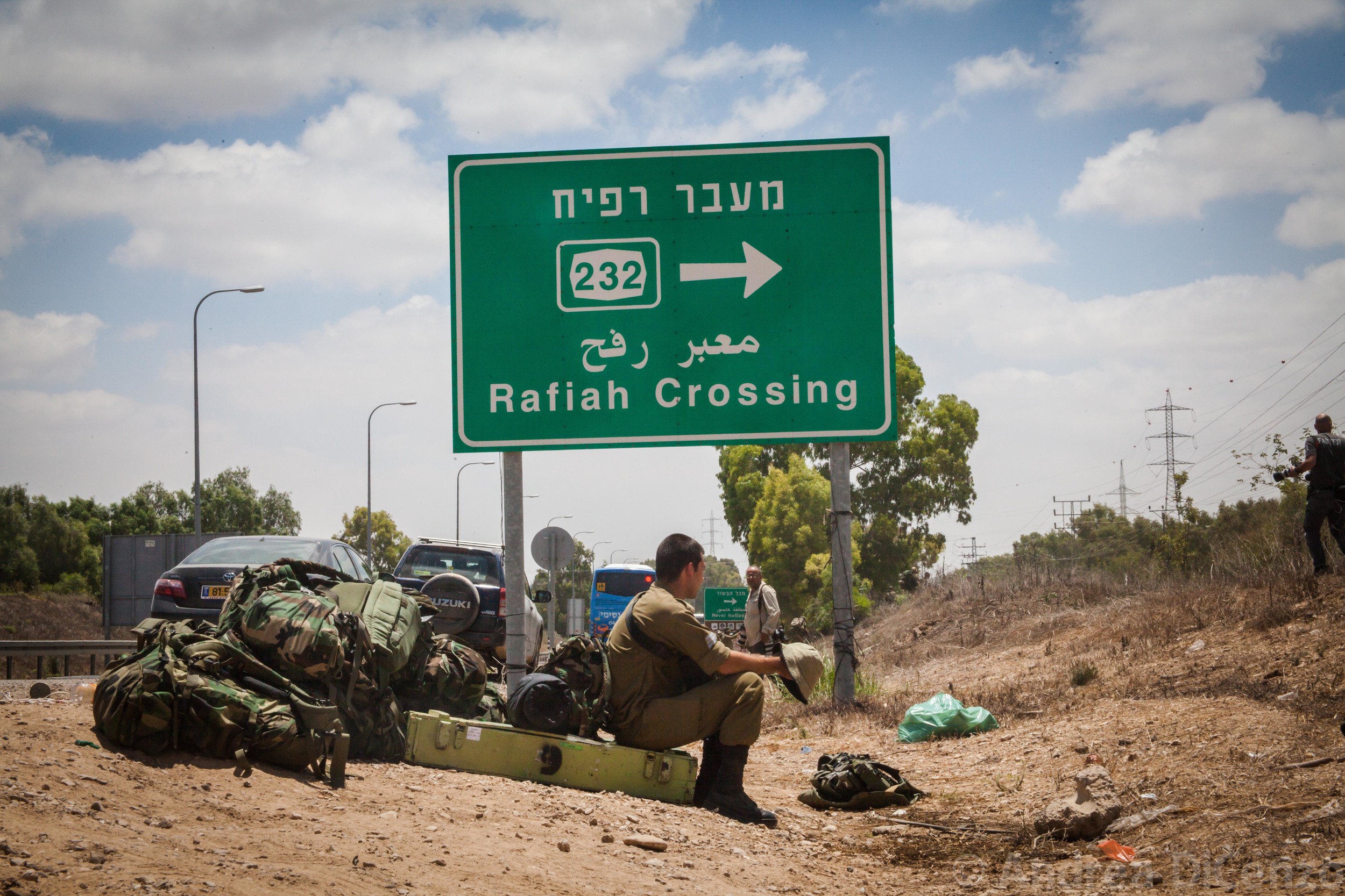  A soldier waits with equipment on the Israel/Gaza border as the ground incursion begins for Operation Protective Edge. An additional 18,000 soldiers are being called up to the border of Gaza to supplement the 40,000 soldiers already in position.&nbs