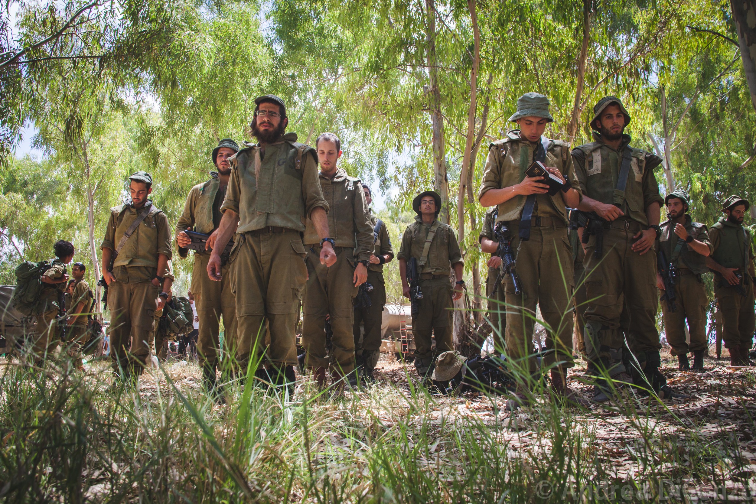  Israeli soldiers pray before their deployment into Gaza during Operation Protective Edge.&nbsp; 