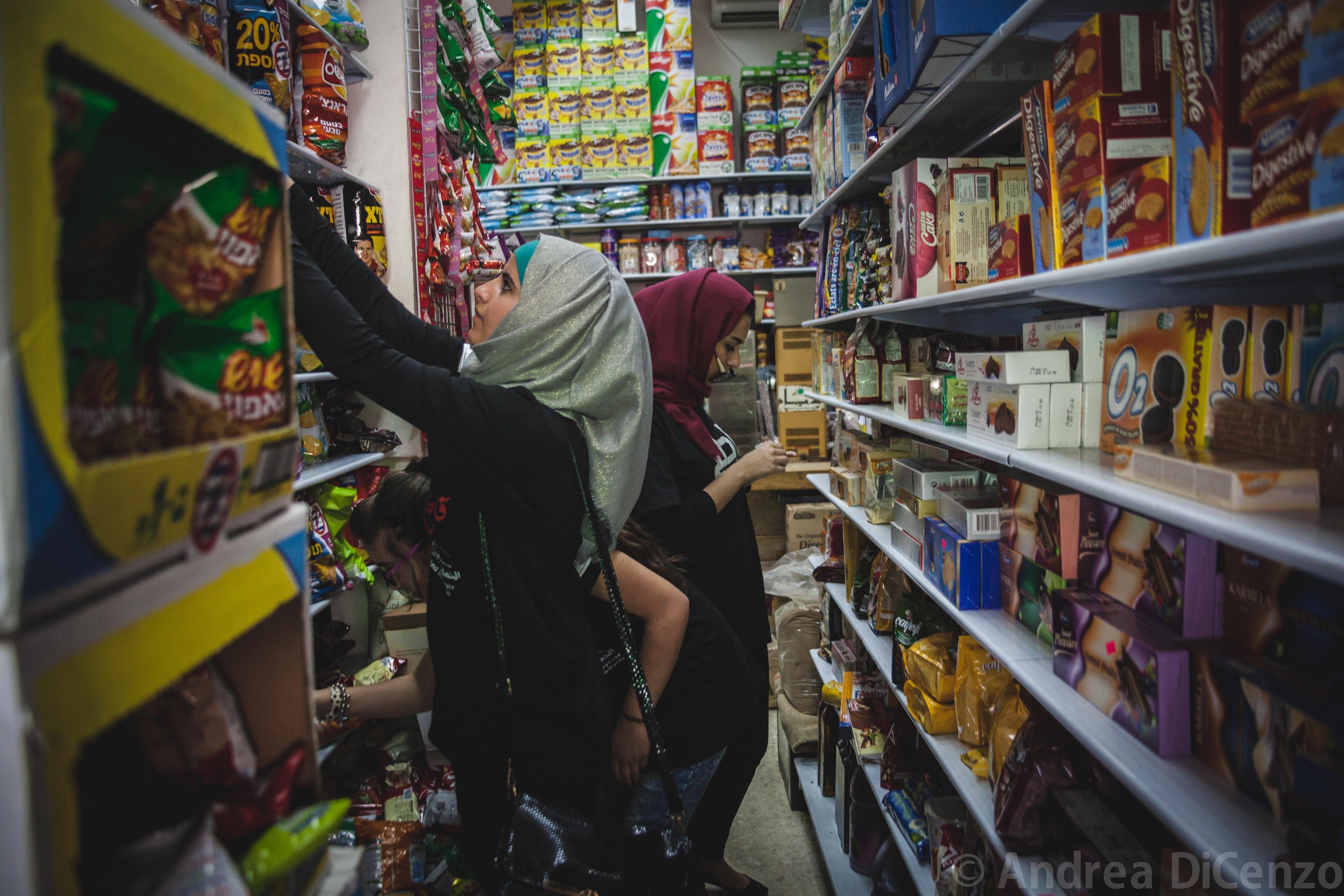  Palestinian women put stickers on Israeli products in Bethlehem, West Bank as part of the Palestinian boycott movement.&nbsp; 