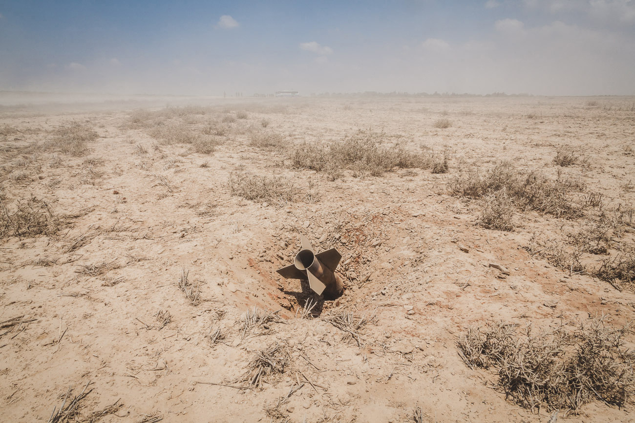  A rocket sticks out of the ground in a field&nbsp;that surrounds kibbutz&nbsp;Nirim - located only two kilometers from the south eastern Gaza border.&nbsp; 