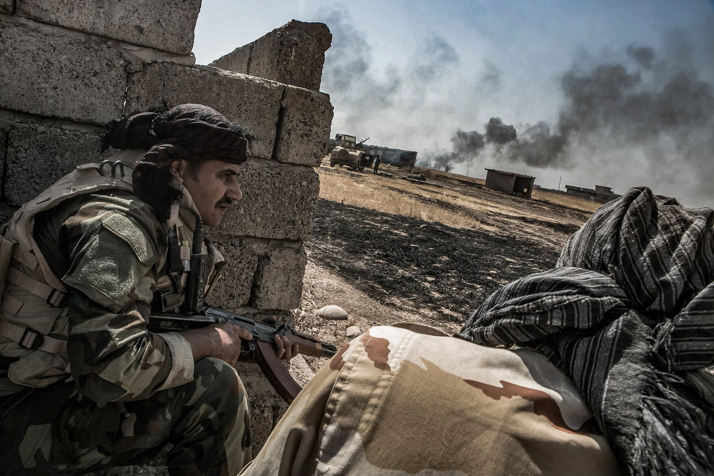 Peshmerga forces during an operation to retake villages under the control of the Islamic State, southeast of Mosul, Iraq. August, 2016.