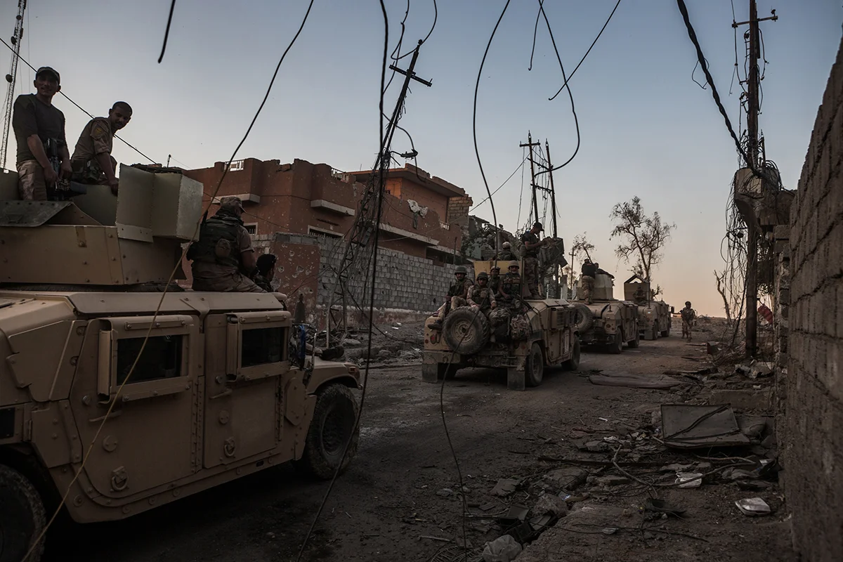 Iraqi 16th division Humvees move through west Mosul as Iraqi forces battle to take the back the last remaining streets of al-Zinjili neighborhood from the Islamic State. Iraqi forces have accelerated their advance on the militants who have only a a few remaining districts under their control. June 4, 2017.