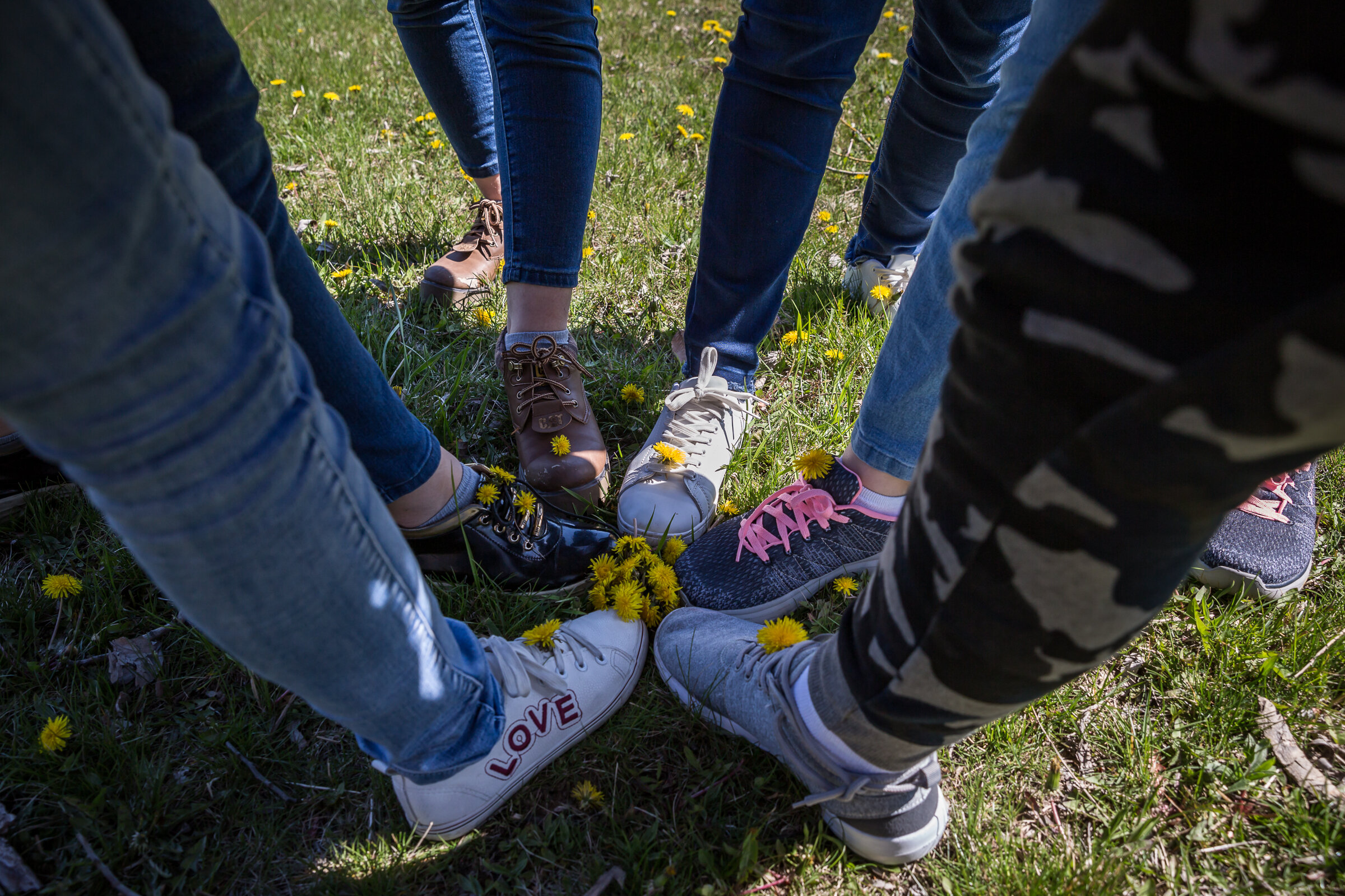 Members of the Afghan Dreamers robotics team play in a field behind their hotel after competing in the FIRST Robotic Championships in Detroit, Michigan. The all-female robotics team from Afghanistan spent four-months in North America competing in di