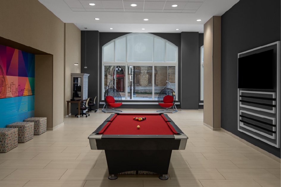 Play Lounge Area of the Home2 Suites + Tru Hotel by Hilton | Shell Building