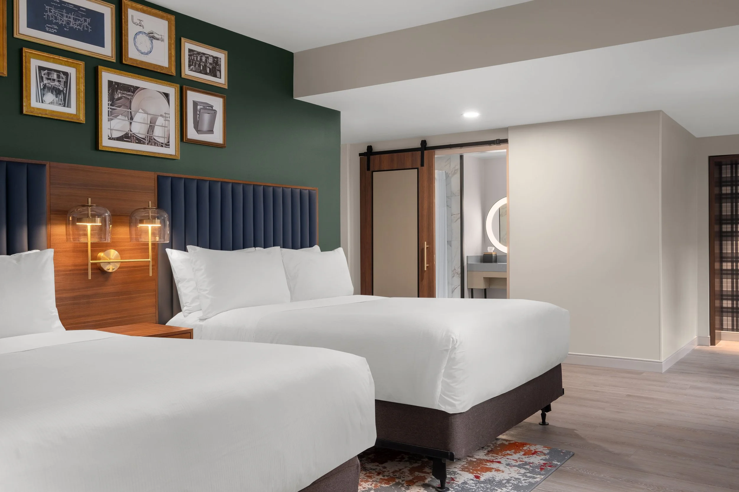 Hotel Ardent guest room with art wall feature.