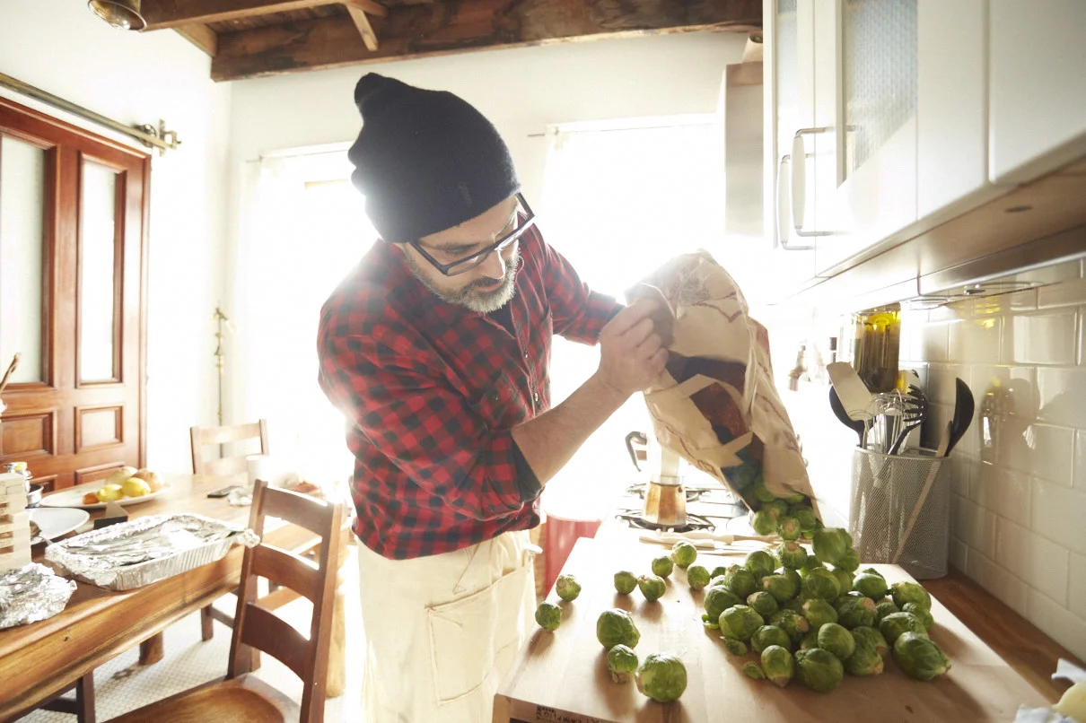 Andrew Scrivani preparing Thanksgiving dinner in The Bowler