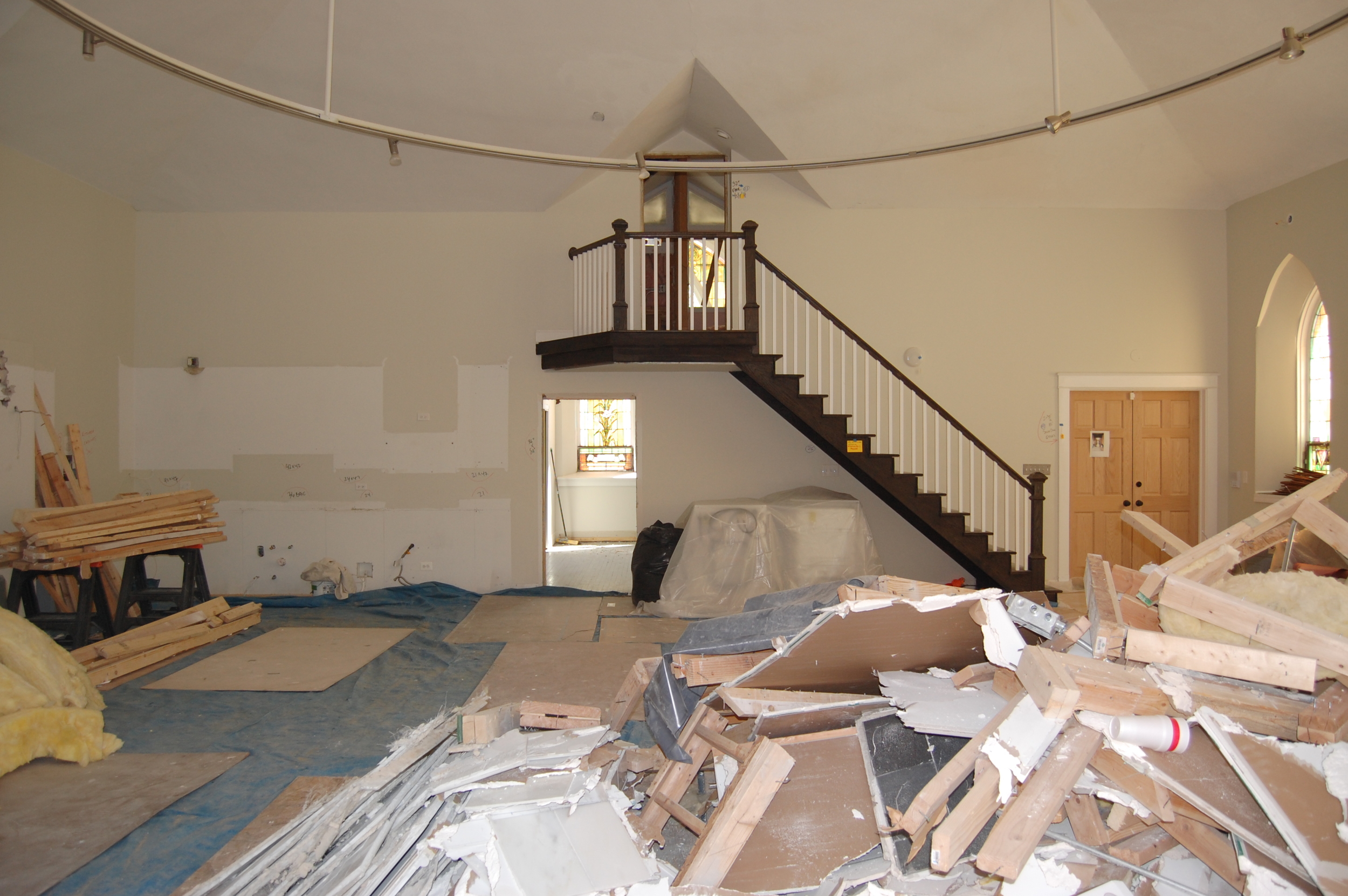 Existing staircase that will be transformed with a floating landing with glass panels