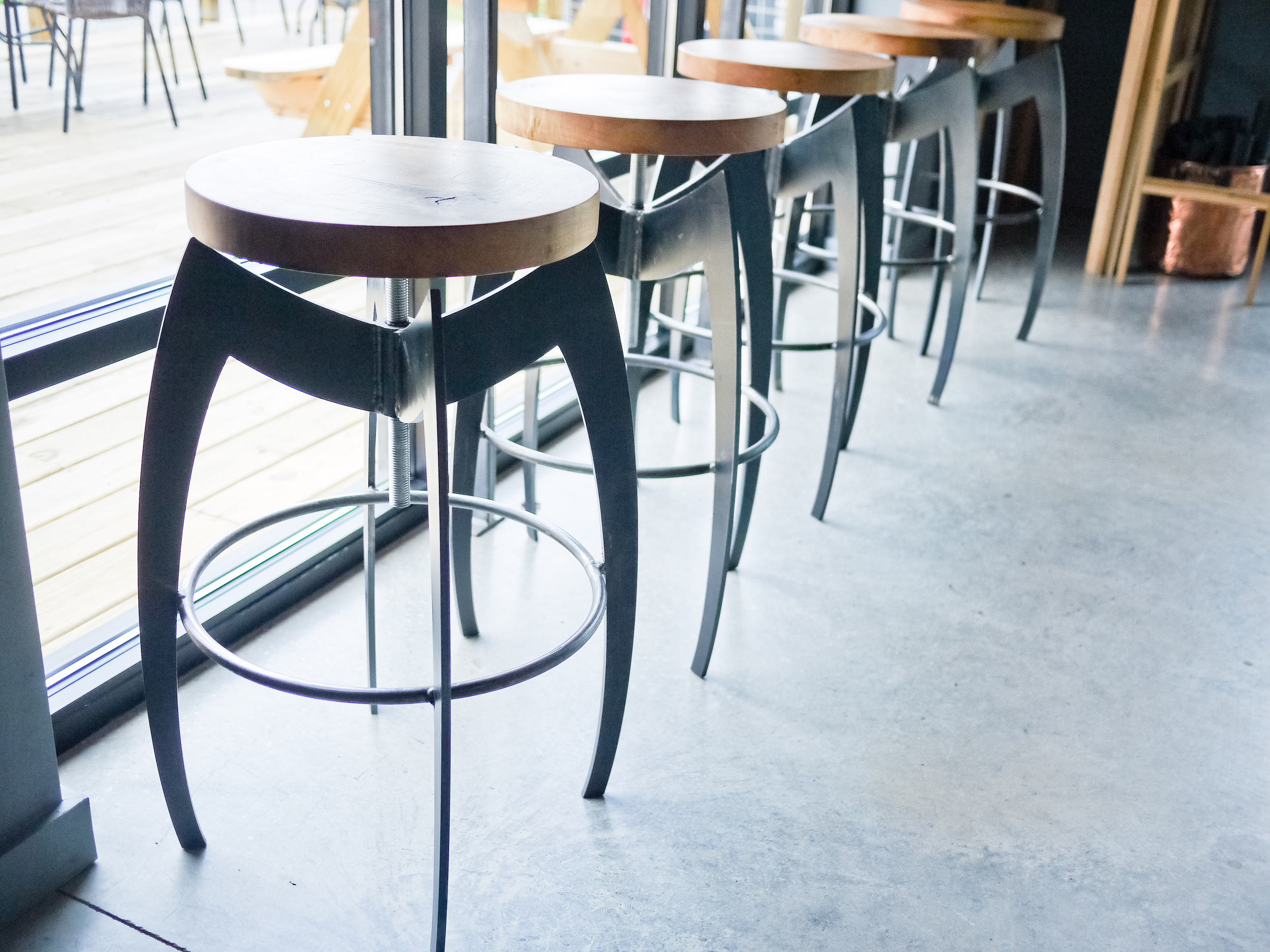 The bar stools at Cardinal Spirits.