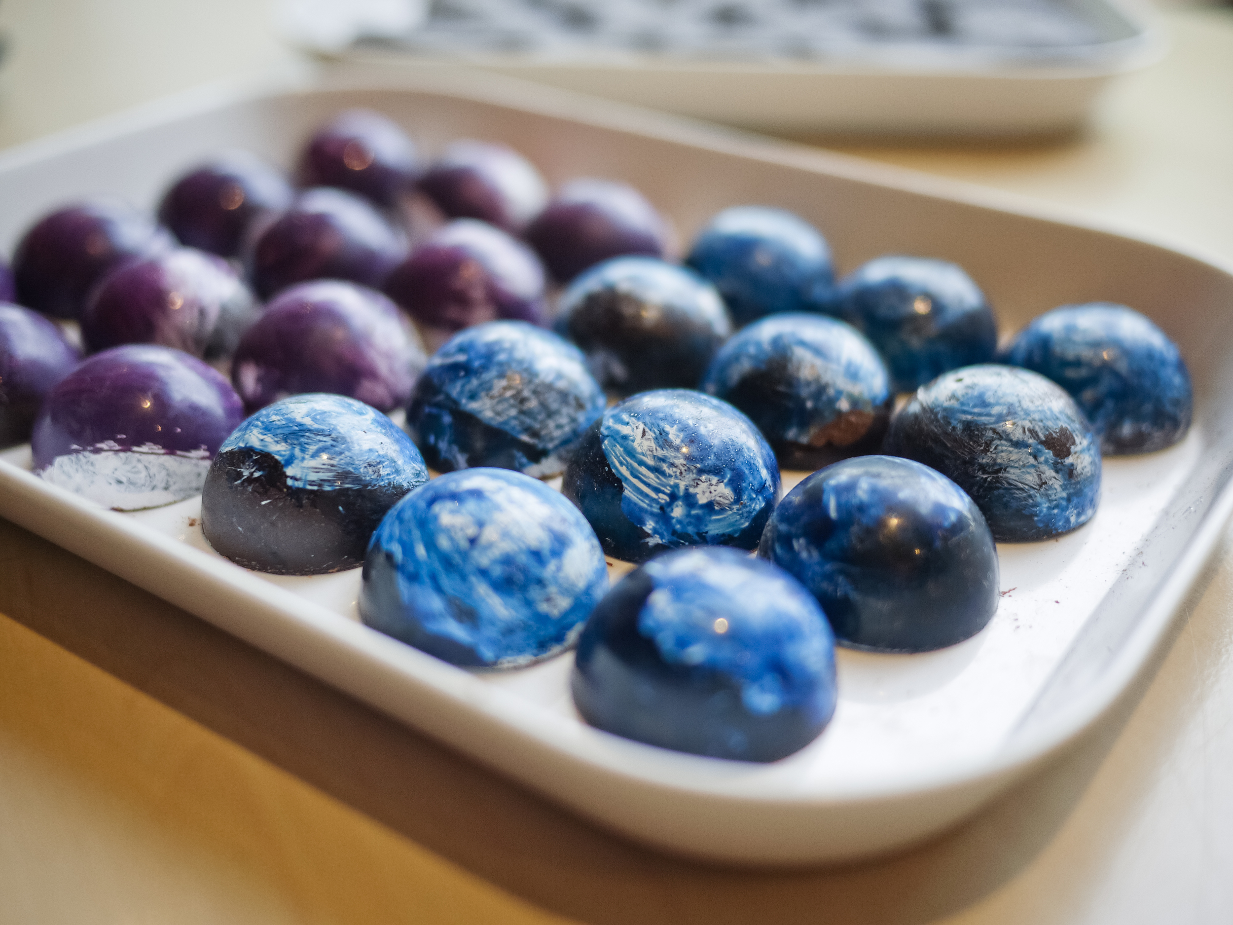 Lavender and dark chocolate-ganache chocolates.
