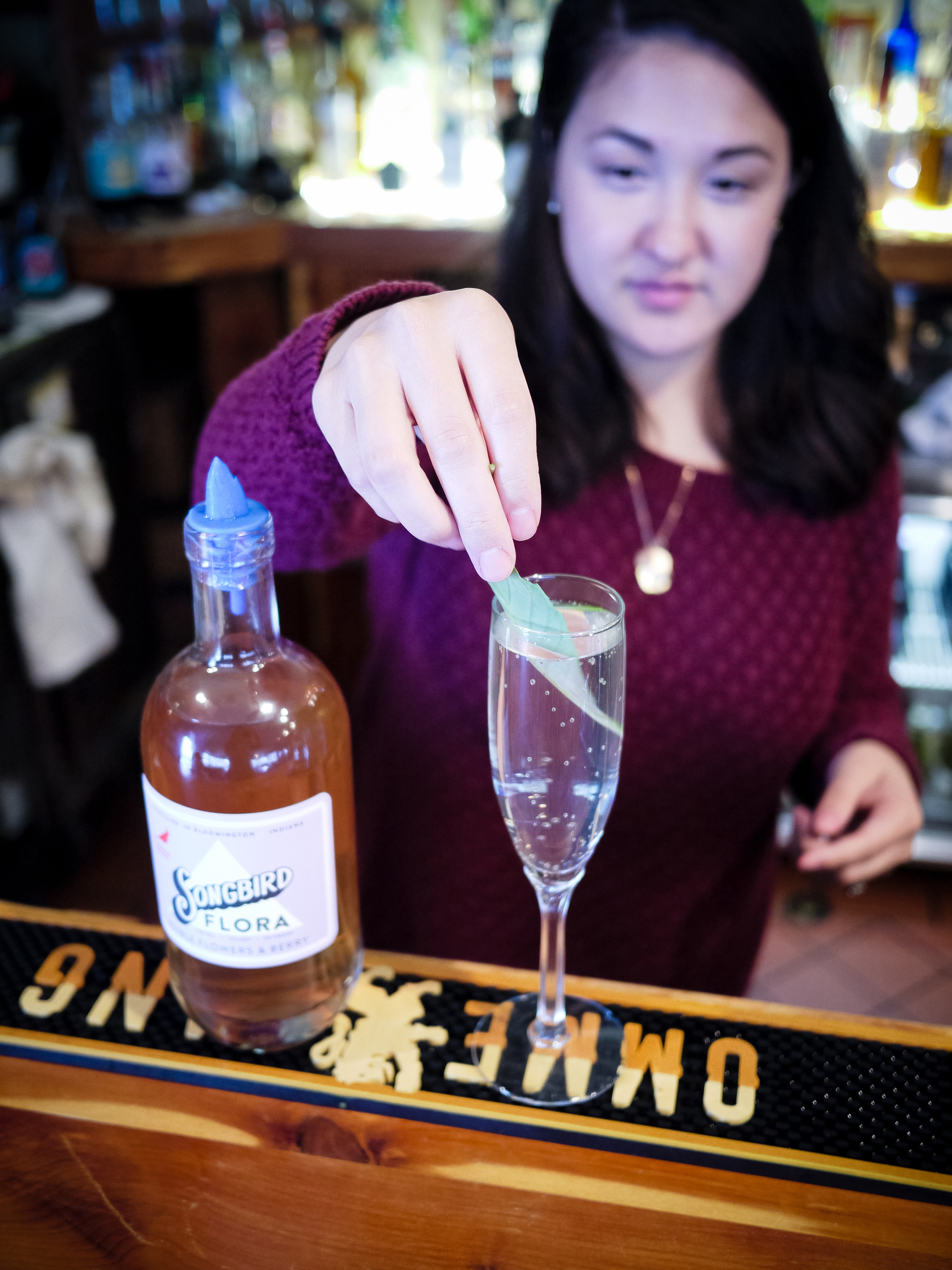 Sadie makes a brunch drink with Cardinal Spirits Flora and champagne. 