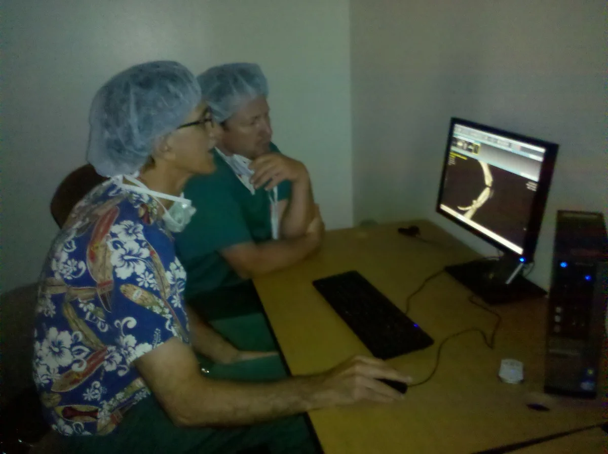Simon and Grafinger viewing CT results