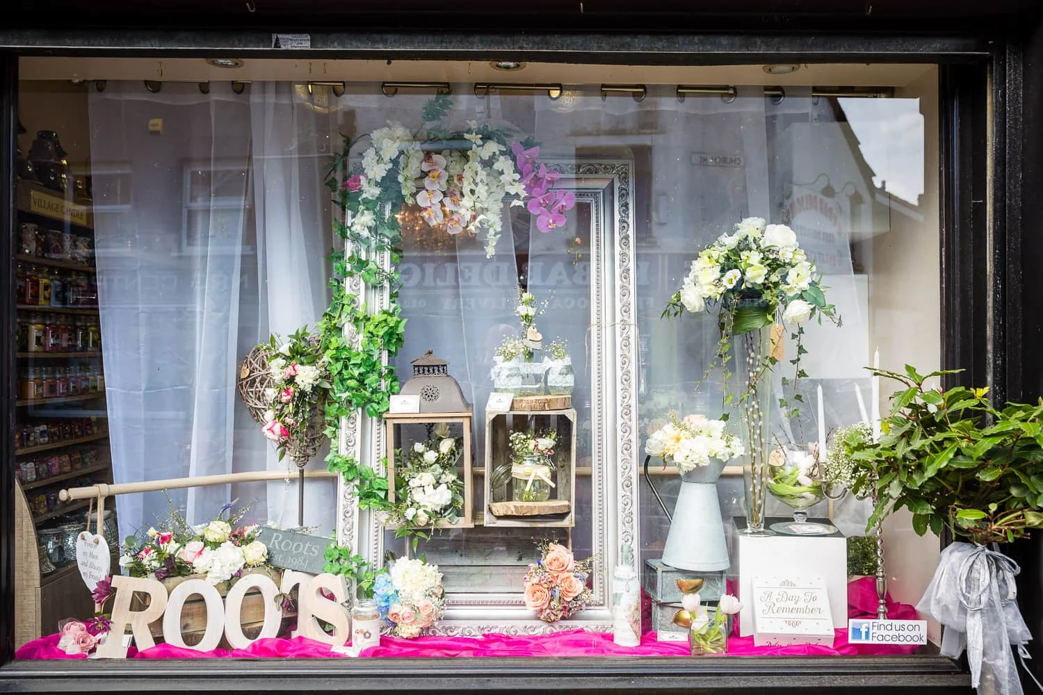 window display at roots flowers