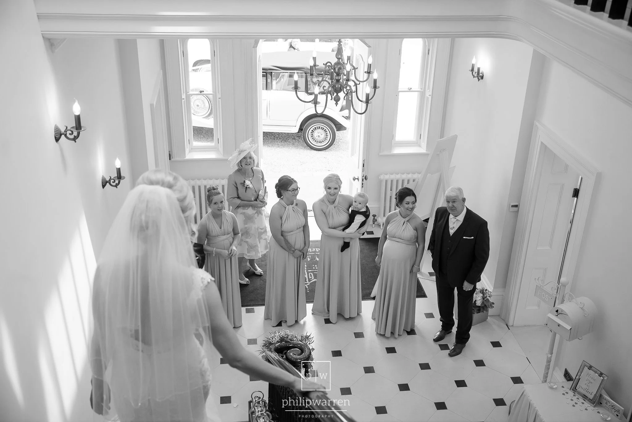 bride walking down the stairs at st tewdrics house