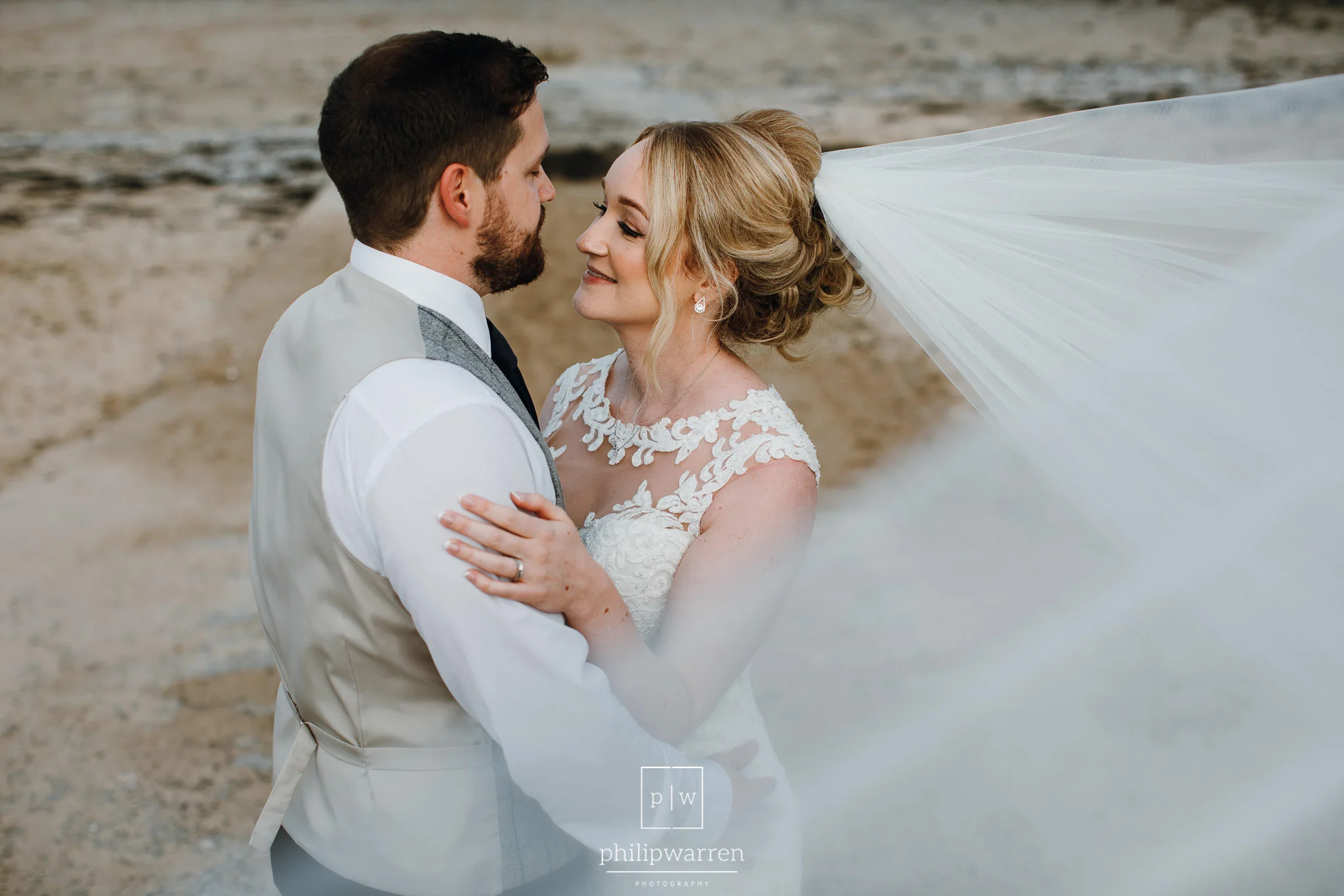 wedding photos on the beach at oxwich bay