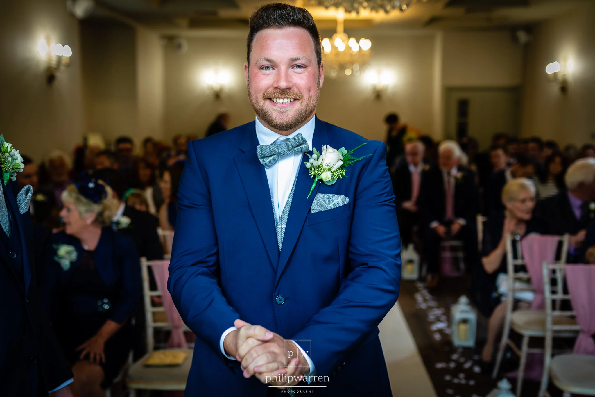 groom looking nervous before the wedding ceremony