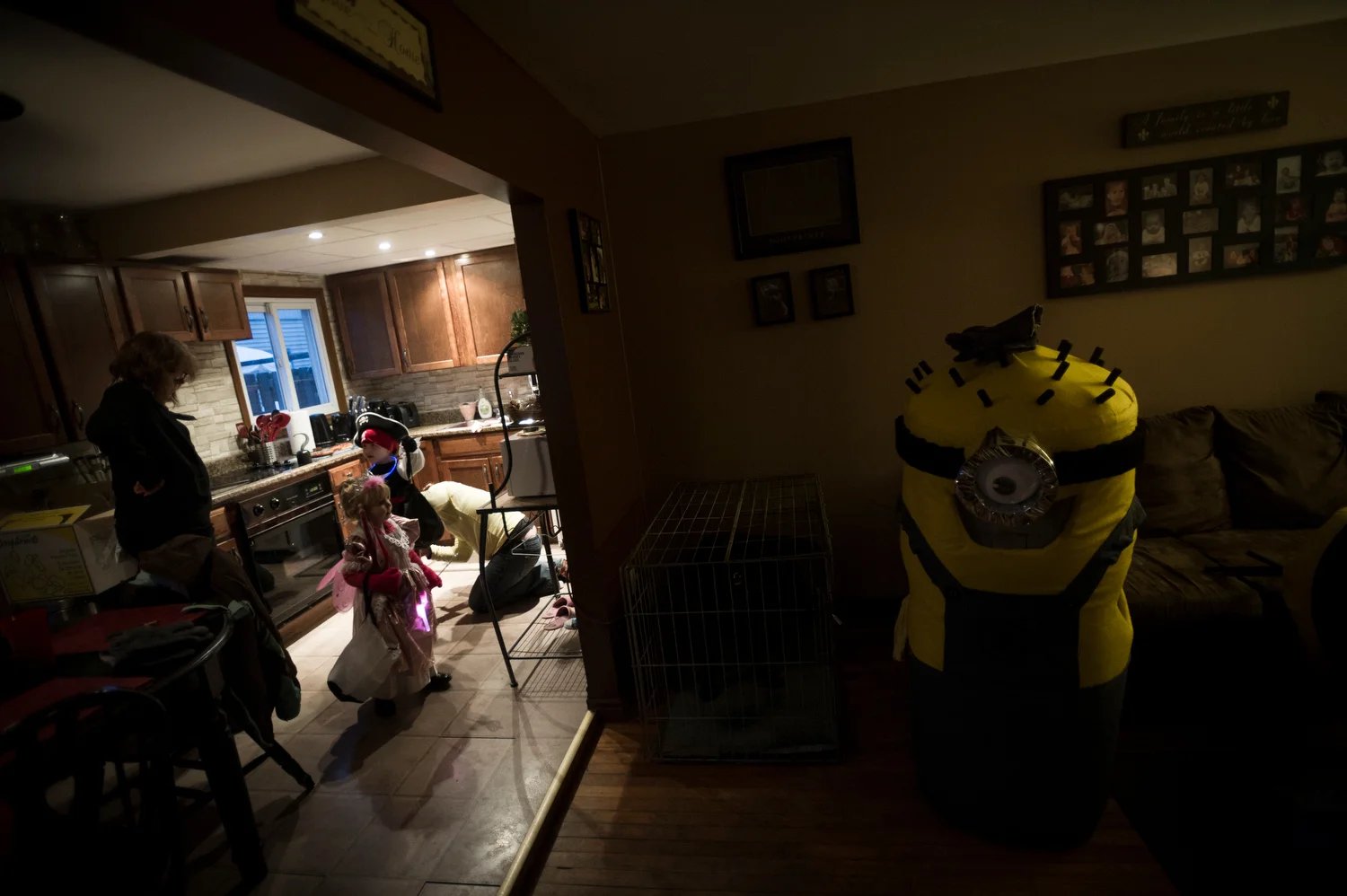 trick-or-treating The kids play around while the parents get ready before putting on their handmade "Minion" costumes.