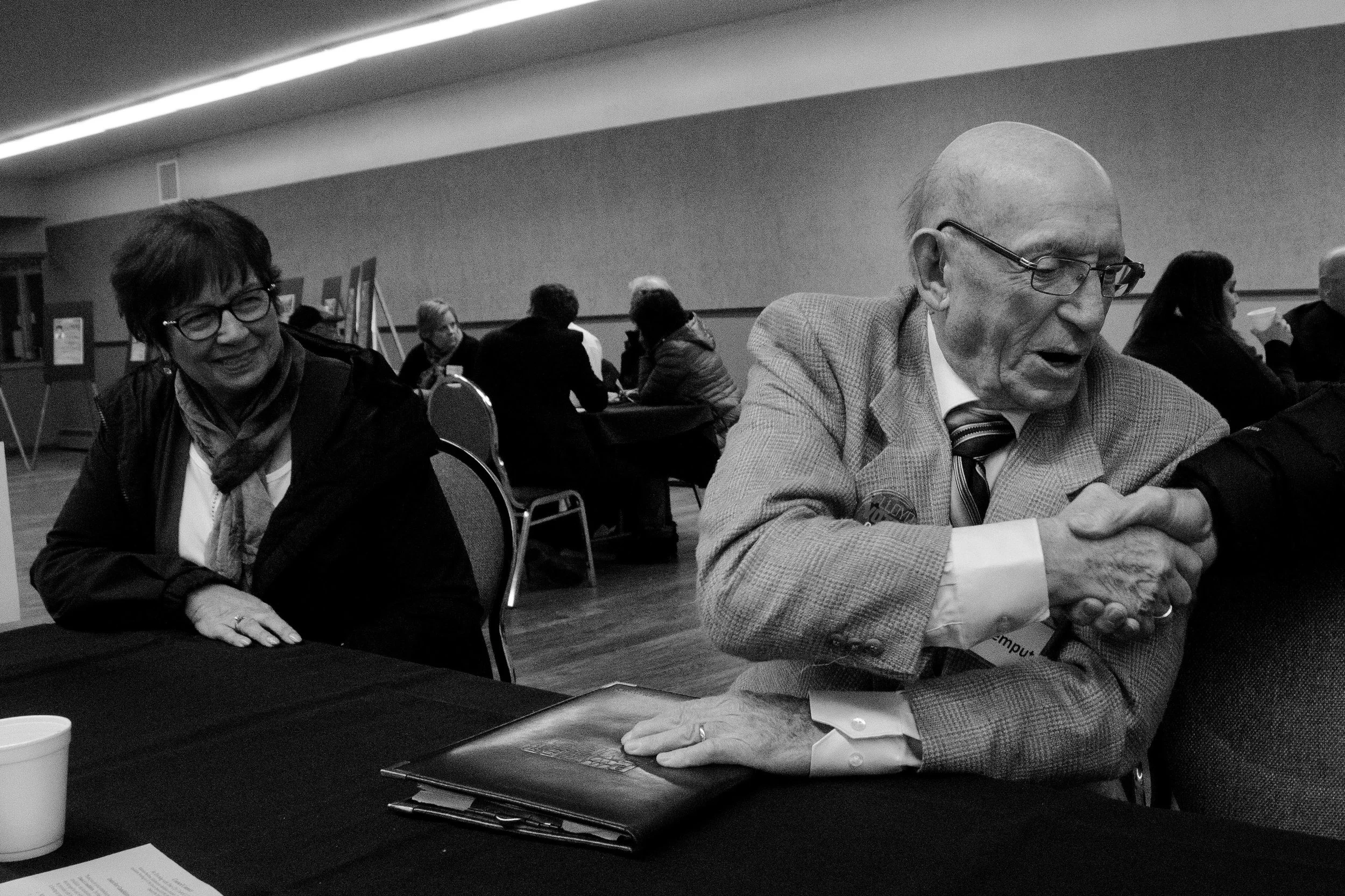 John Van Cleemput, a longtime attendee of Lloydminster city council meetings and 2016 council candidate, speaks with residents during a meet and greet event. 