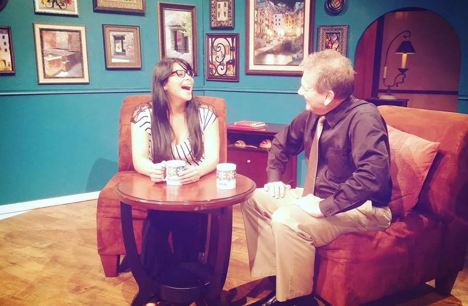 Paola Mendivil shares a laugh on set with Alan during the Hispanic Chamber's October 2015 after-hours event. HCCWM members gathered at WKTV to network and to learn about community media. During the event, FLYB recorded an interview with Chamber member Natanael Krische about his immigrant journey from Guatemala and about running a small business in Grand Rapids.
