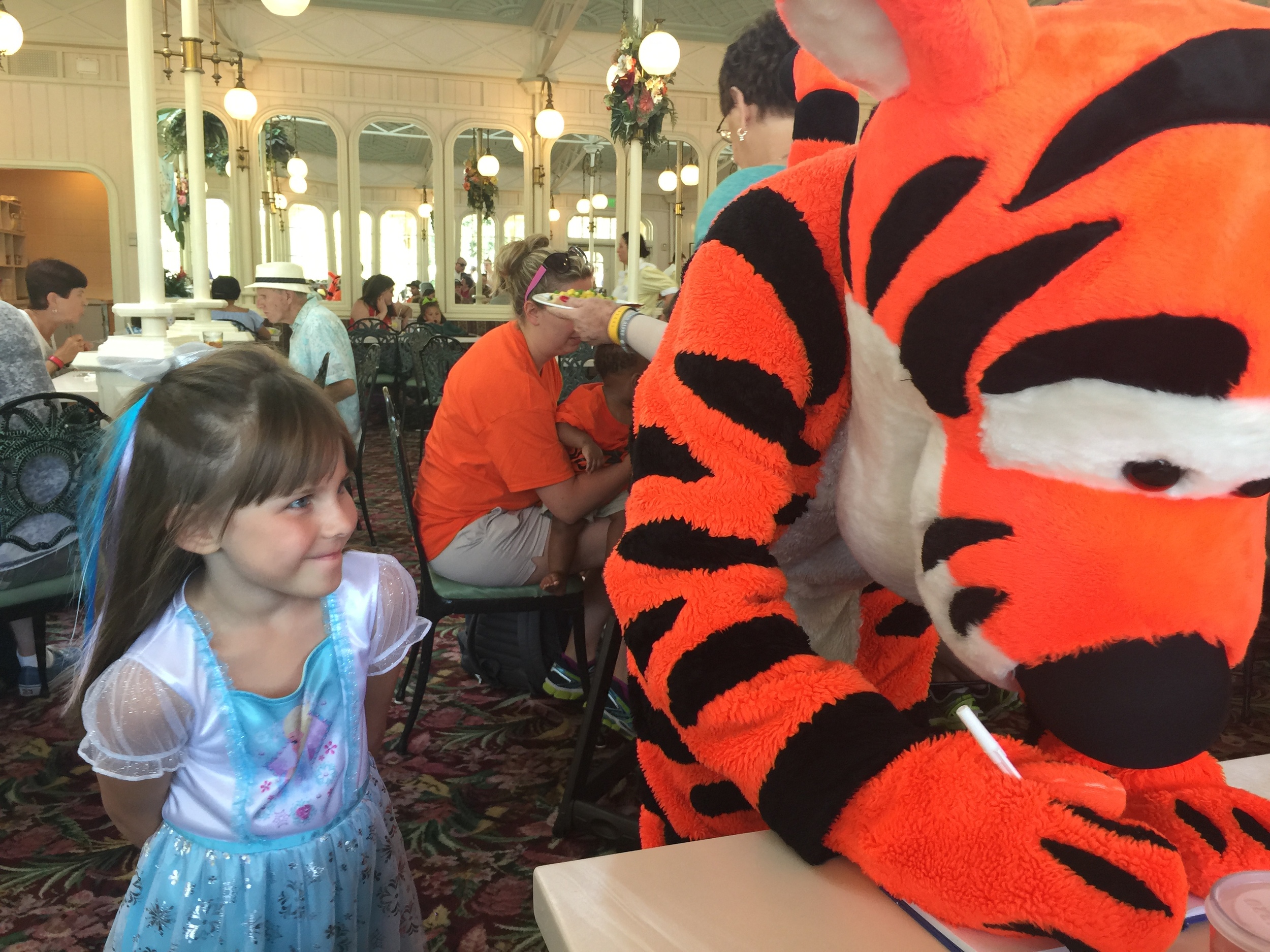 Tigger was fun! He signed Emery's book and made her day! Just look at her face!