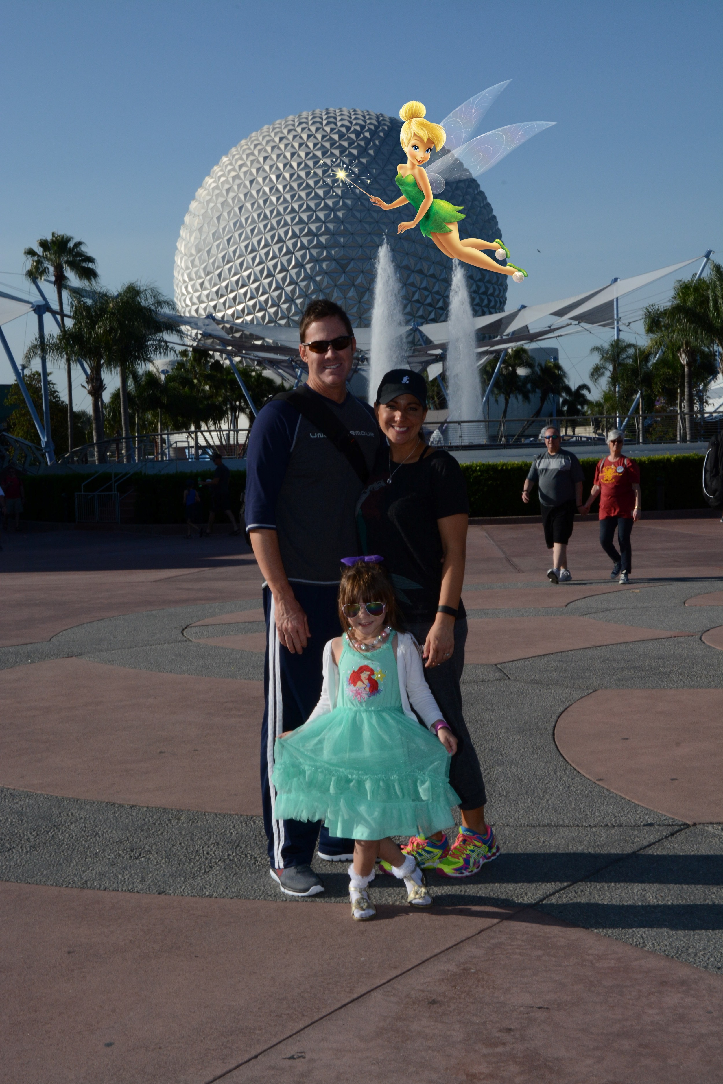 We spent a day in the Park and then a day recovering at our resort. This particular day we were at Epcot - which might be my favorite park! Tink followed us as our magical tour guide the whole way through!