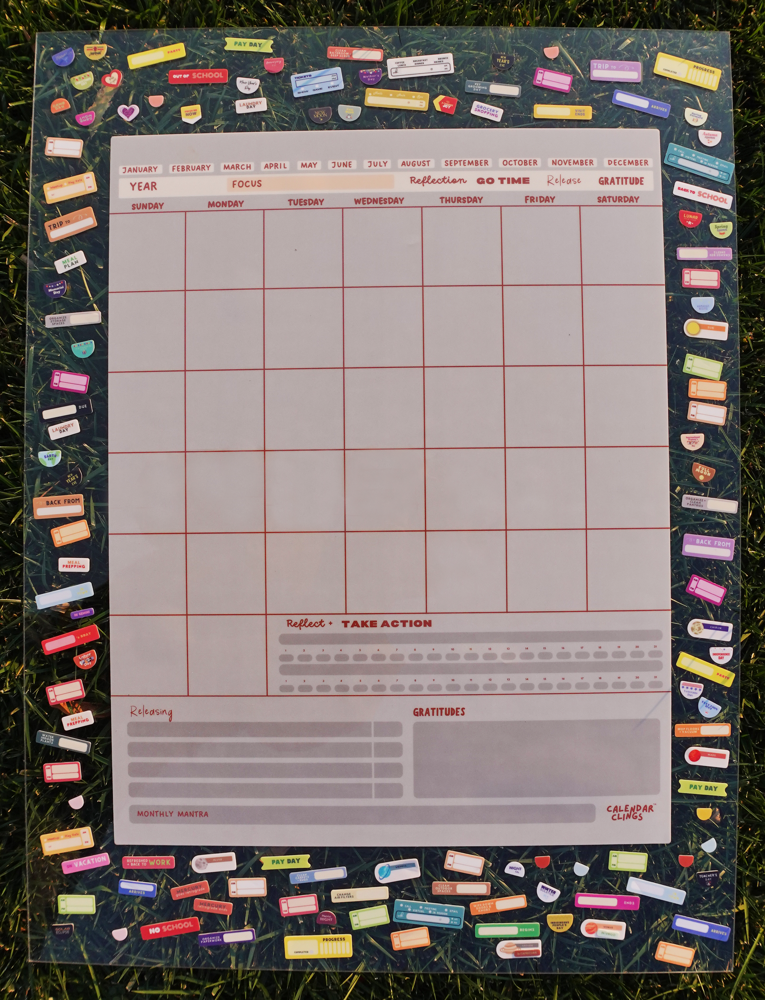 Gray Calendar surrounded by Clings on Acrylic.png