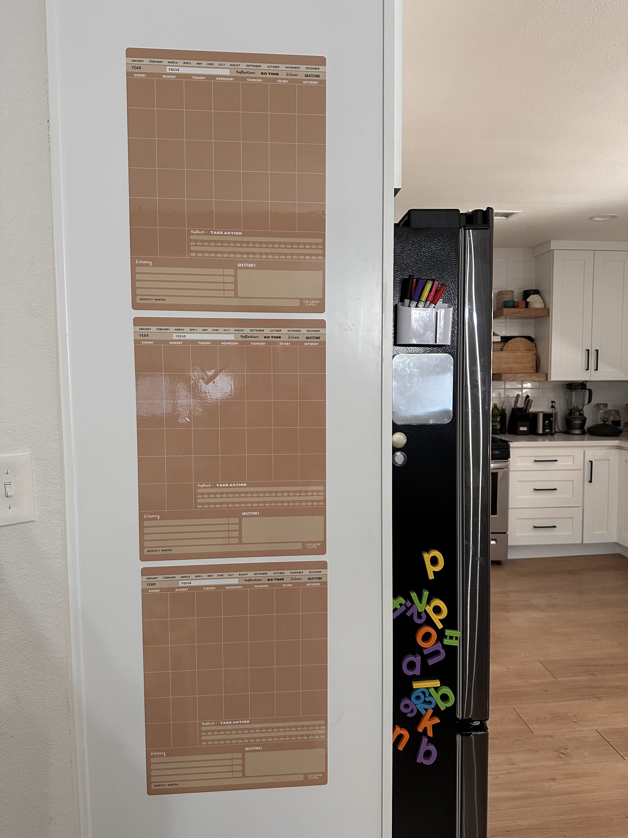 Beige Calendar + Moon Cycle in Kitchen.png