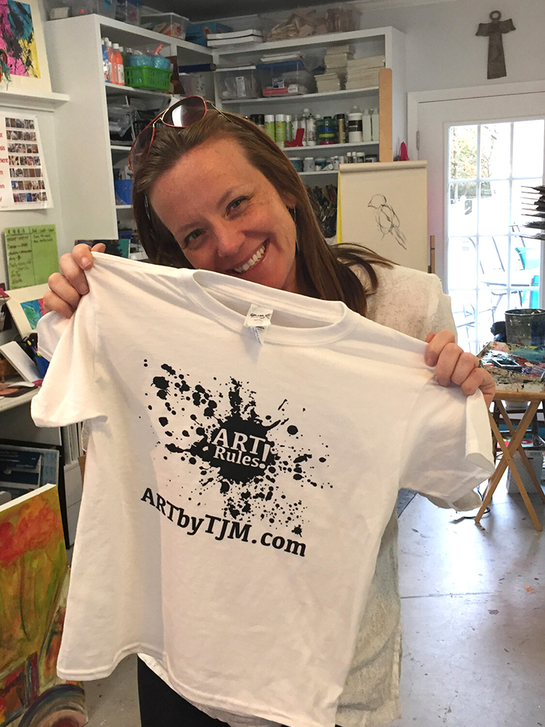 artist-tracey-j-marshall-in-studio-with-tee-shirts-for-her-summer-camp-to-be-tie-dyed-IMG_4728-crop.jpg