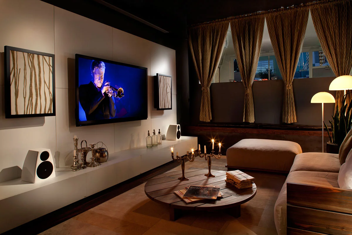 Pioneer Elite TV with Artcoustic on-wall and Meridian DSP 3200 speakers