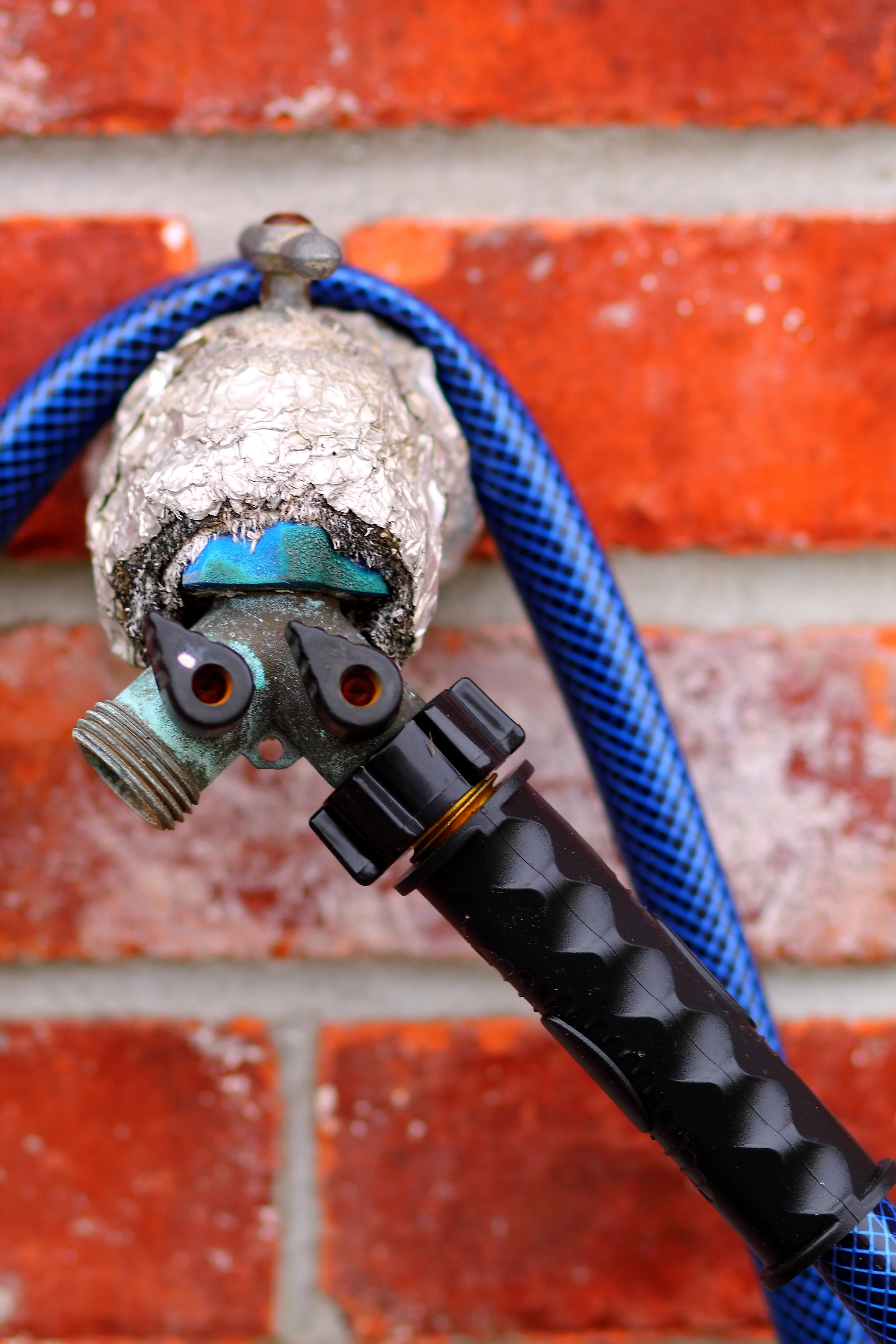 Red brick faucet.JPG