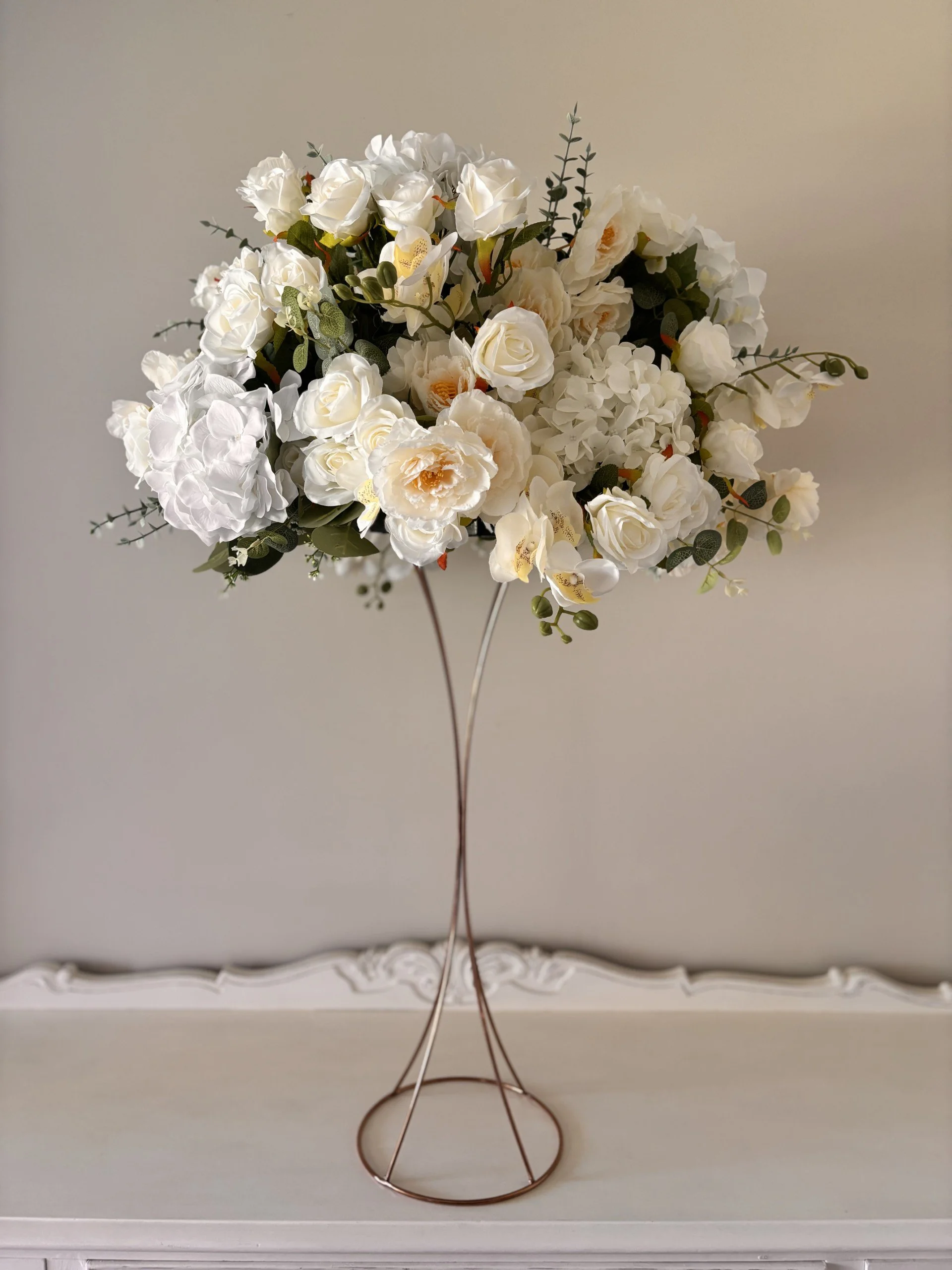Silk floral arrangement elevated tall wedding
