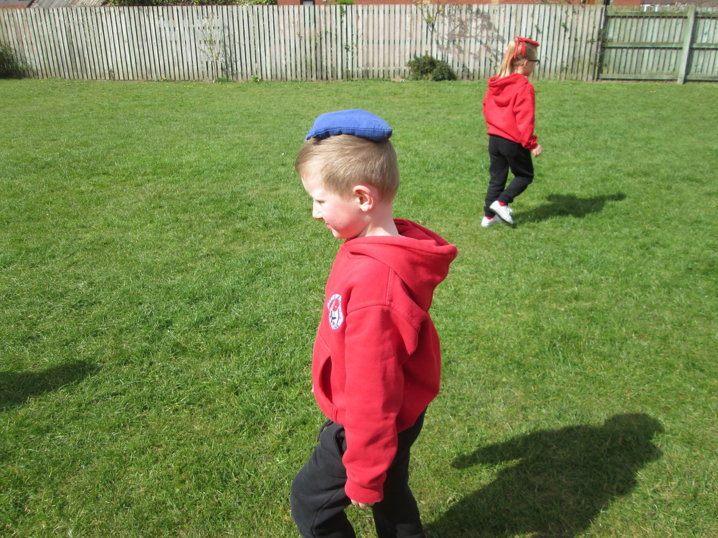 Here we are doing PE in the sunshine. Great balancing Charlie.