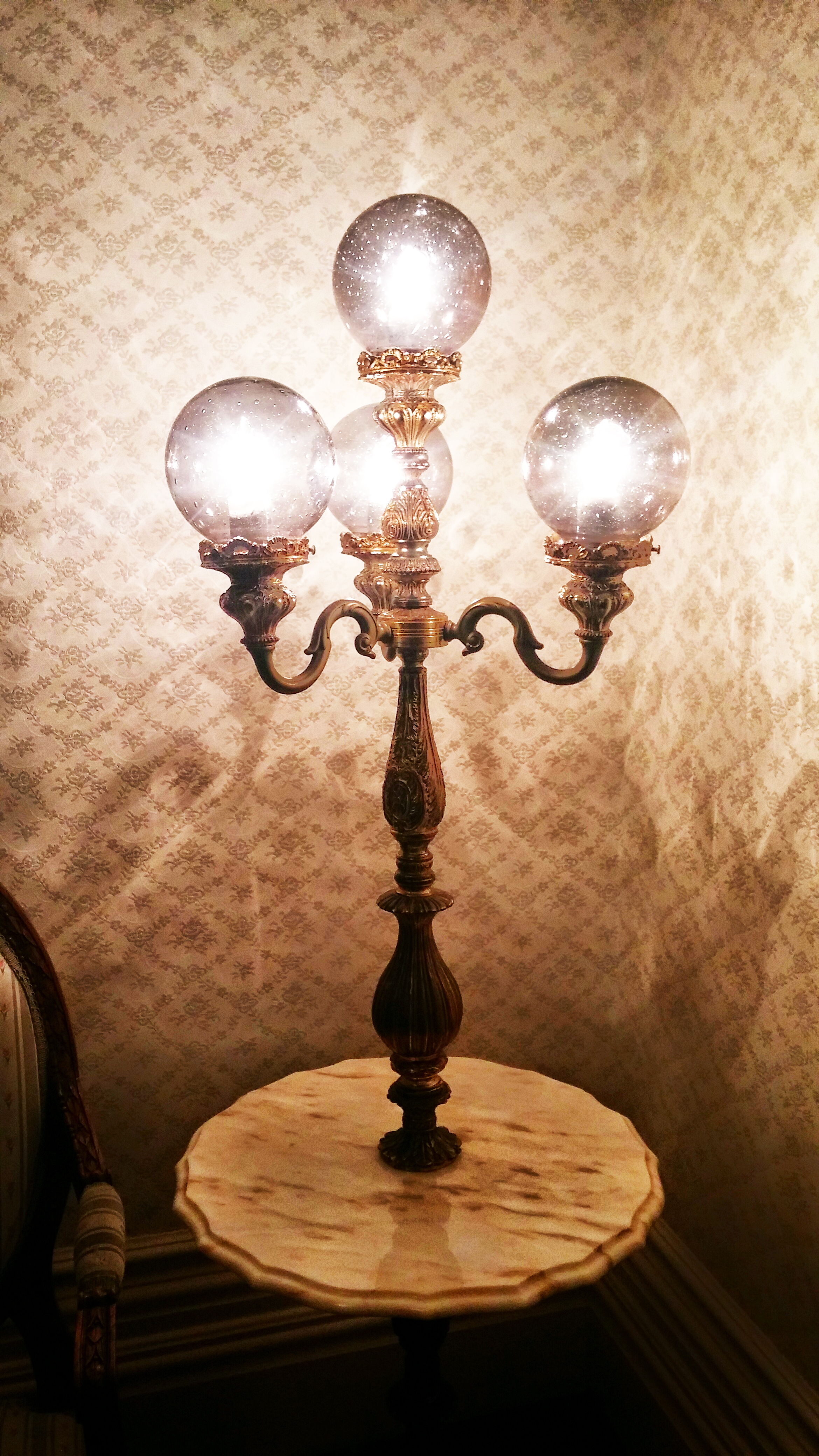  Vintage lamp illuminates our middle visitation room. 