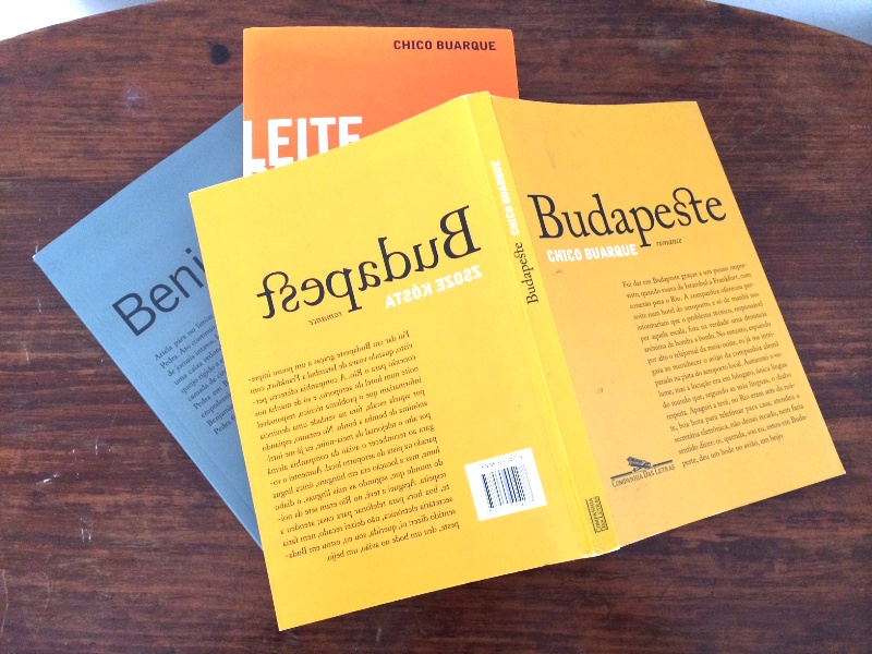 Brazilian editions of Chico Buarque's books, including an edition of Budapest with Buarque's name on front cover and a mirror-image back cover bearing Zsose Kósta's name.