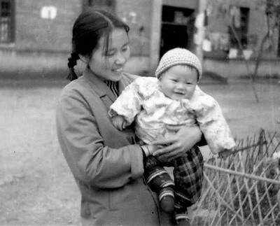 Can Xue with her son at 6 months, 1979.