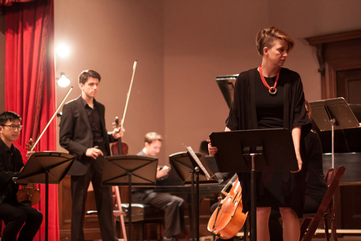 The musicians take the stage prior to their performance of Victoria Polevá's "No Man Is an Island."