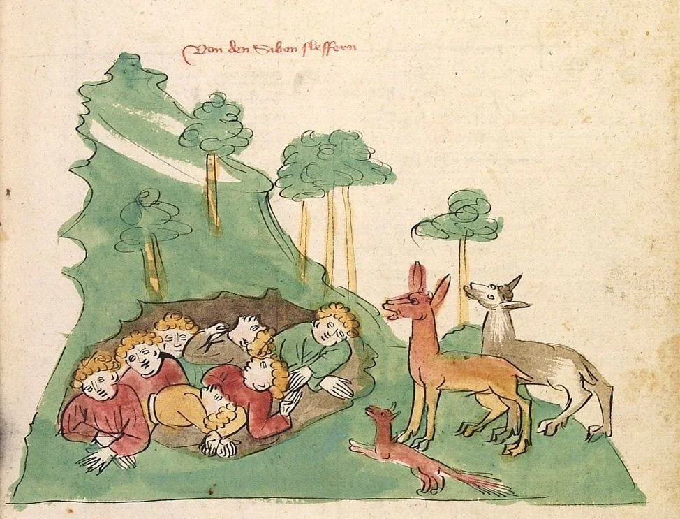 Two deer and a fox visit the Seven Sleepers in an Alsatian manuscript illustration, ca. 1418. Courtesy of the University of Heidelberg.