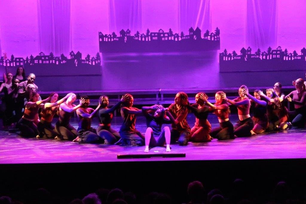  Dancers sitting on stage 