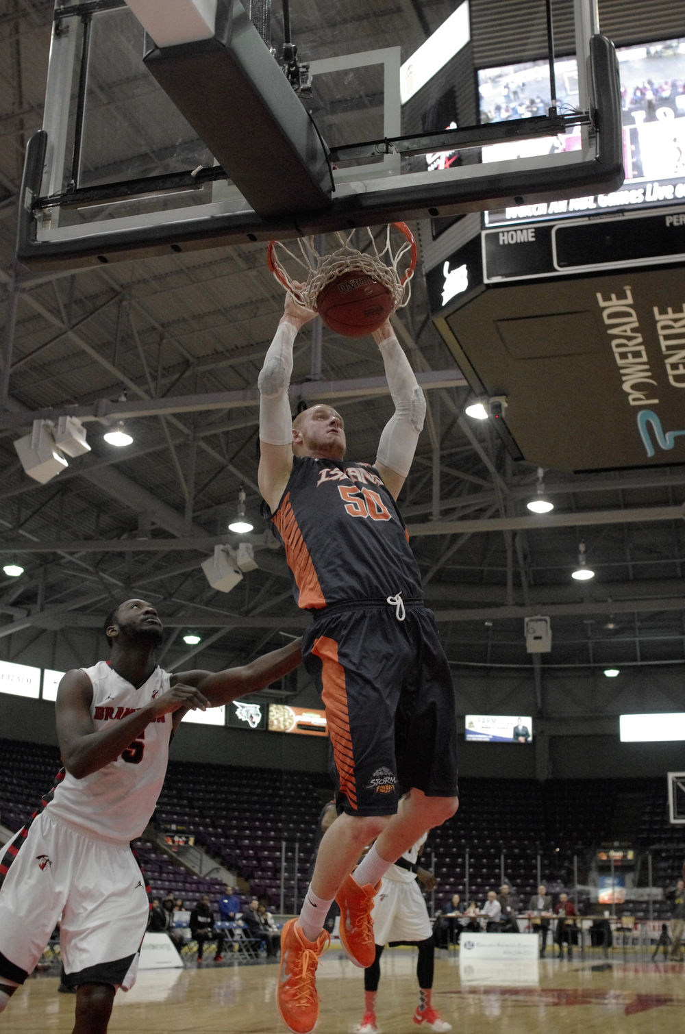  Nick Evans of the Charlottetown Island Storm completes a slam dunk in a game against the Brampton A's in the Powerade Centre in Brampton, Ontario, on January 29, 2015. &nbsp;As Published in Snapd Brampton, March 2015. 